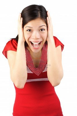 4679520-happily-surprised-woman-holding-her-head-in-amazement-isolated-on-white
